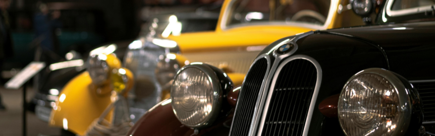 picture of black and yellow classic cars